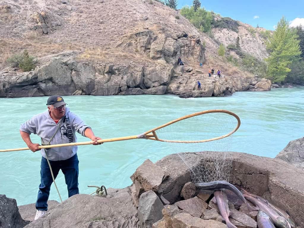 TNG Fisheries Manager Randy Billlyboy dipnet fishing at Gwetsilh (Siwash)