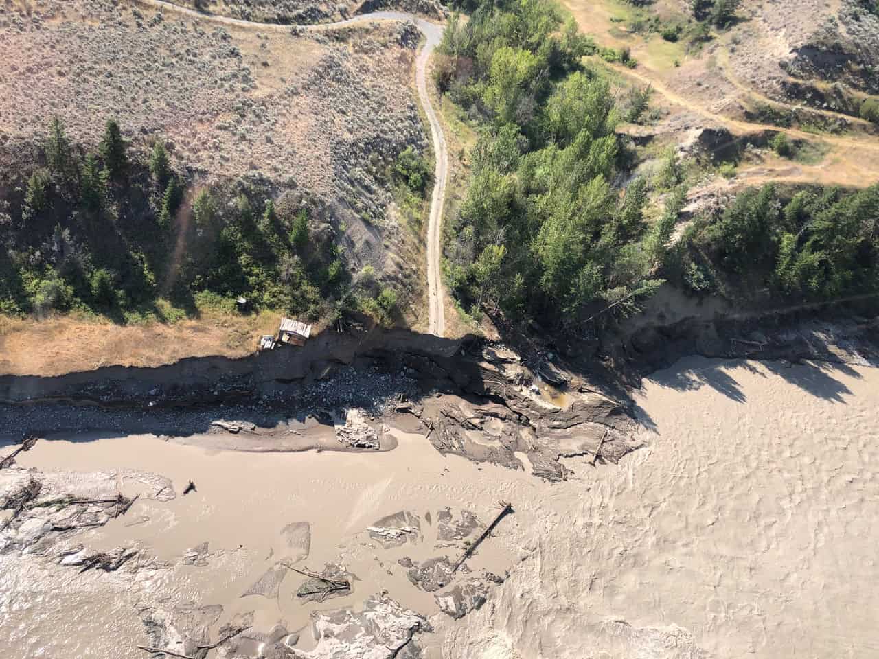 Wineglass Ranch after the Aug 5 breakout flood – severe erosion from record-high breakout flood with loss of buildings and destabilized hillslopes (Aug 8, 2024).
