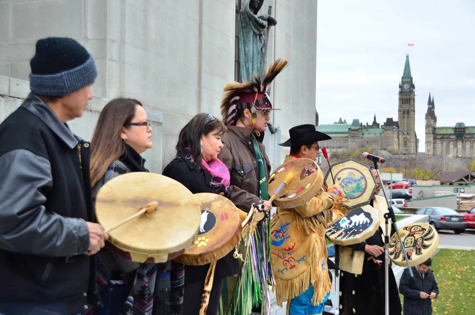 Tŝilhqot’in drummers in regalia outside Parliament in Ottawa during the 2013 Supreme Court hearing. Photo: Jeremy Williams.