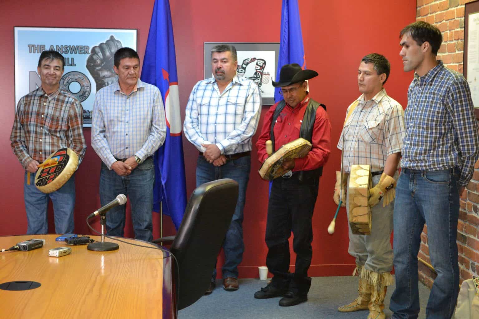 Tŝilhqot’in Nits’ilʔin with drums on the day Aboriginal Title was declared by the Supreme Court of Canada.